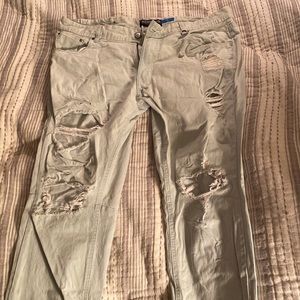 Selling a pair of Hyper Denim slim fit jeans with zippers on the ankles. Size 36